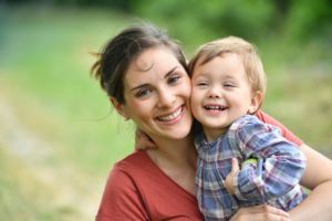 mother and son smiling