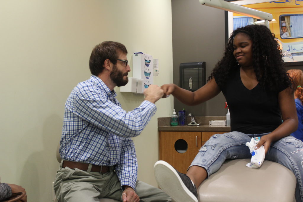 Doctor talking with a patient